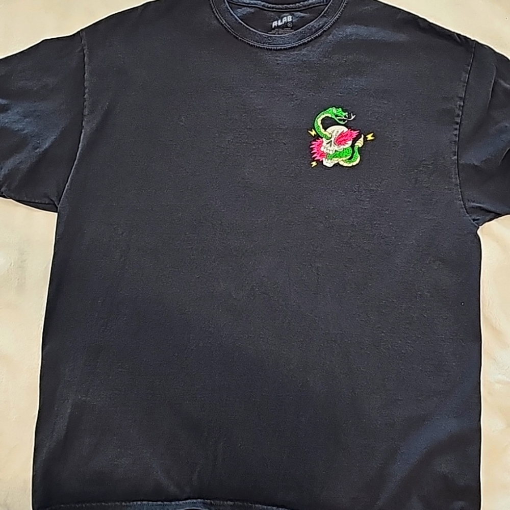 Mens XL shirt in black. Small design on left breast and large design on back.